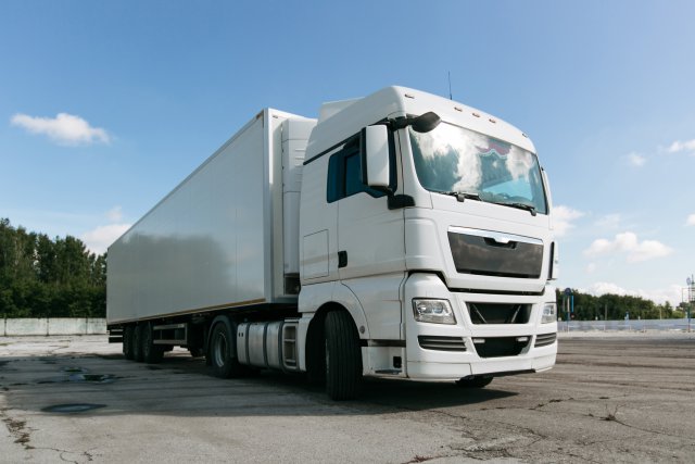 white truck with trailer